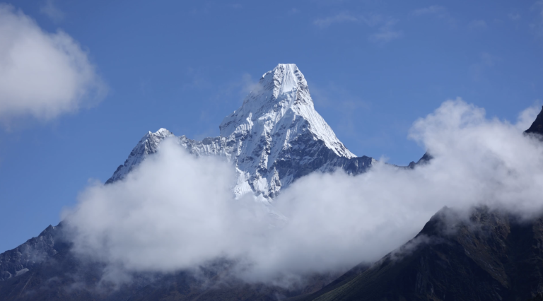 Cloud hovering over a Himalayan mountain